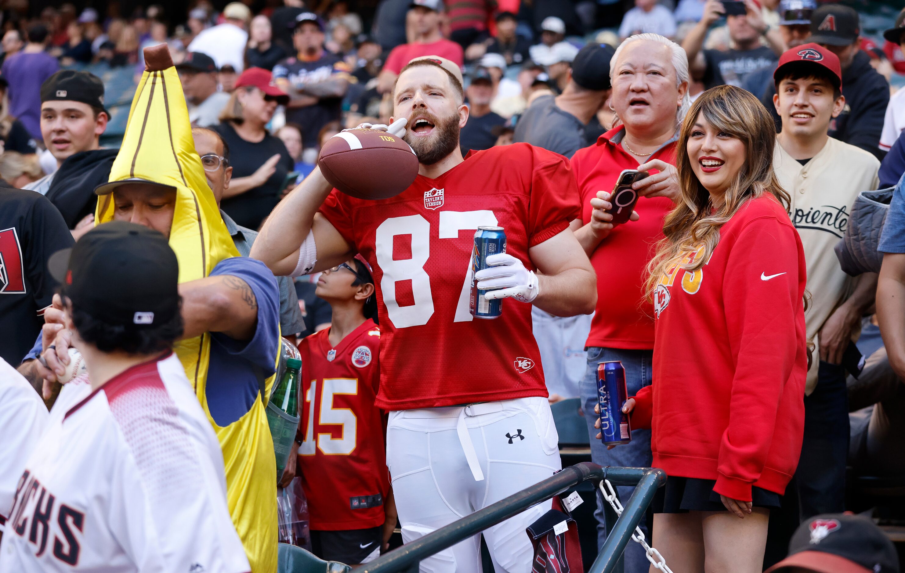 Fans dressed for Halloween as Kansas City Chiefs tight end Travis Kielce and Taylor Swift...