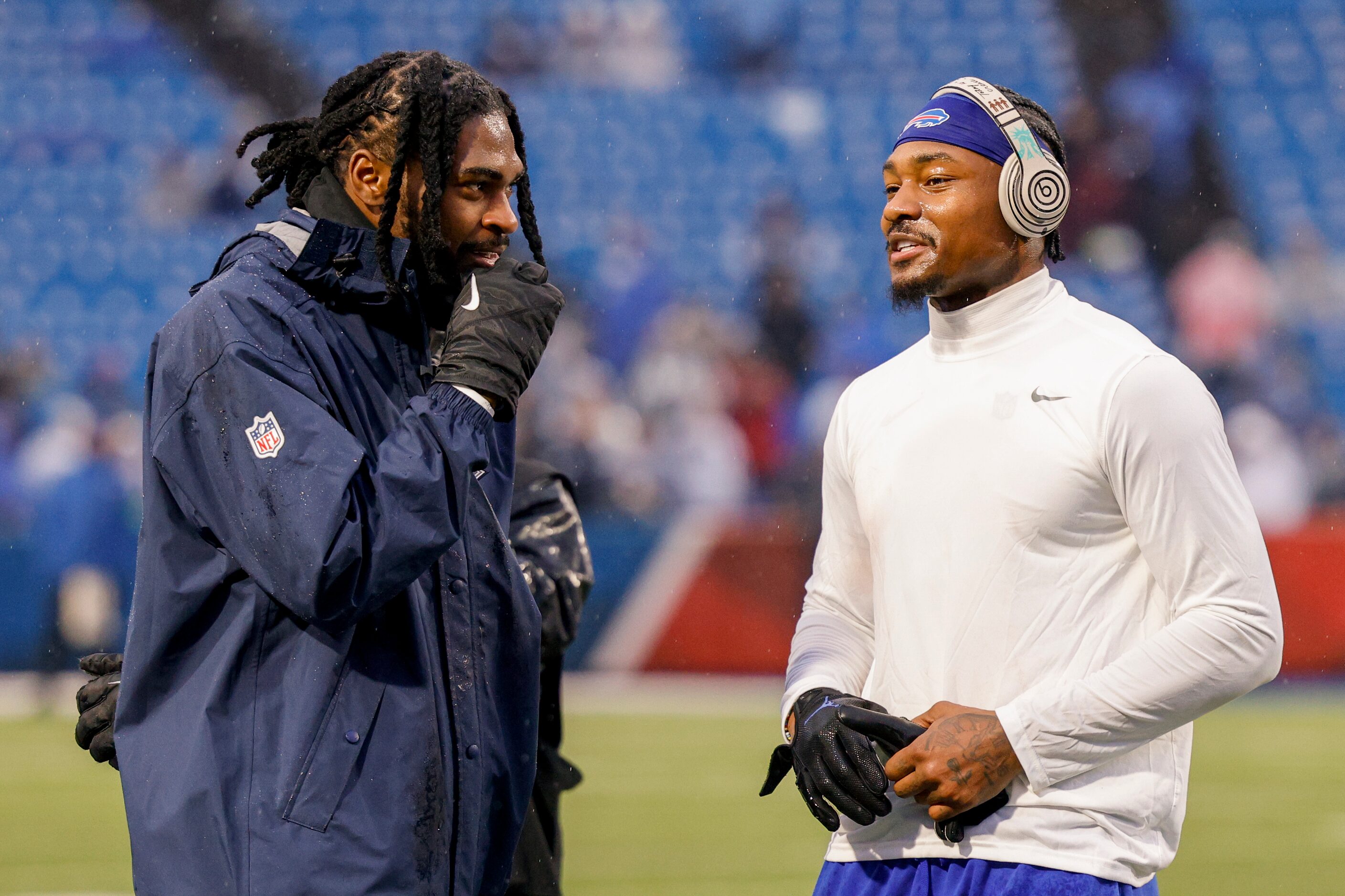 Dallas Cowboys cornerback Trevon Diggs (left) talks with his brother and Buffalo Bills wide...