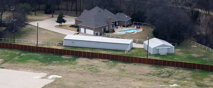 The former home of Grand Prairie ISD Superintendent Susan Simpson Hull -- owned by the...