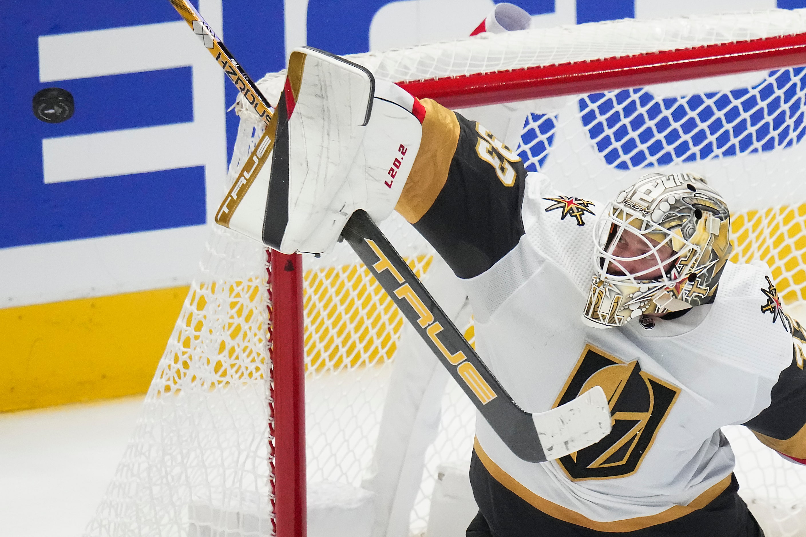 Vegas Golden Knights goaltender Adin Hill makes a save during the third period in Game 3 of...