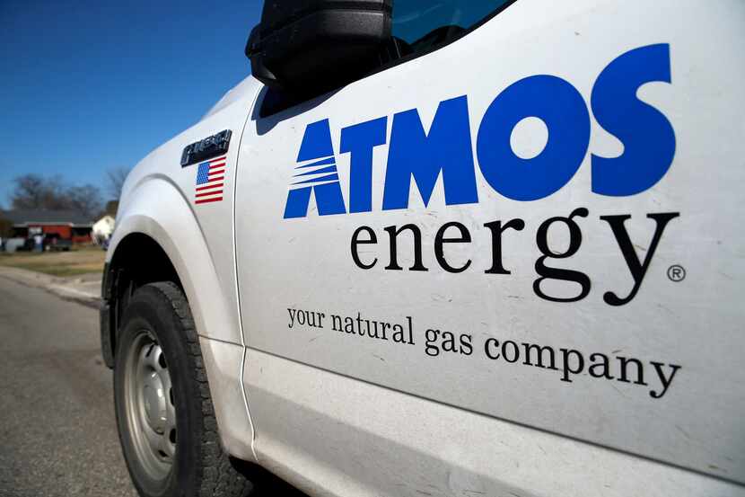 An Atmos Energy truck is on seen where construction crews digging for natural gas lines...