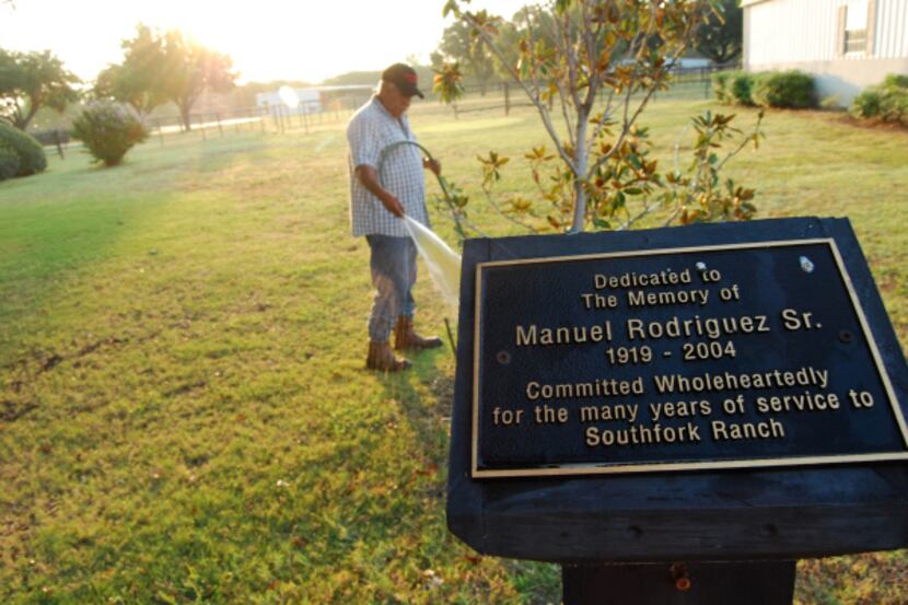 Manuel Rodriguez keeps the grounds tended at Southfork, where a plaque honors his father,...