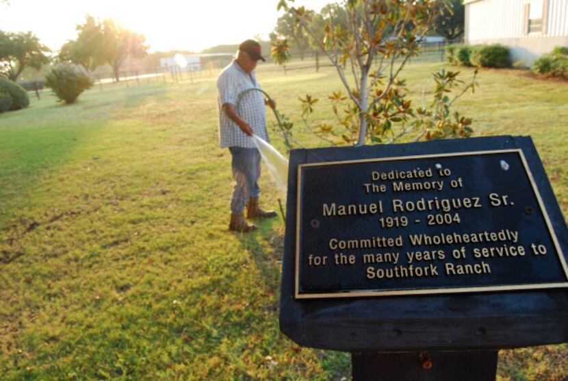 Manuel Rodriguez keeps the grounds tended at Southfork, where a plaque honors his father,...