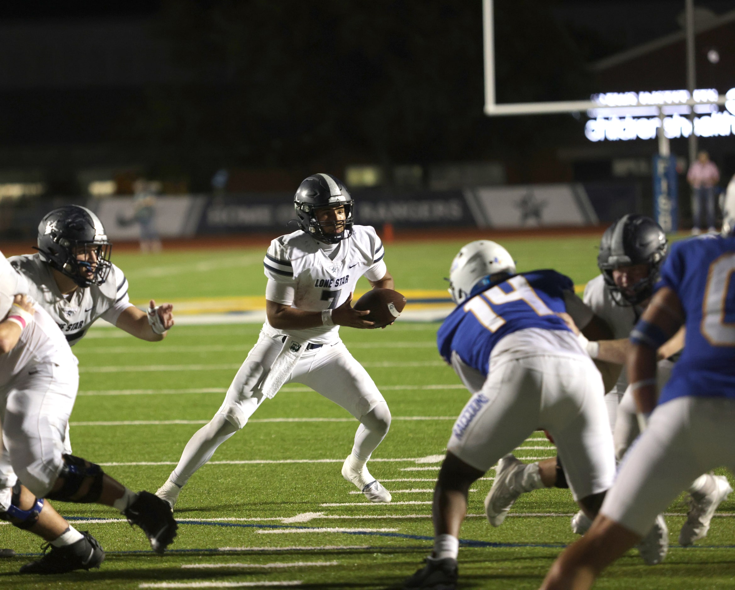 Lone Star player #7 Karece Hoyt searches for a hole during the Frisco Lone Star High School...