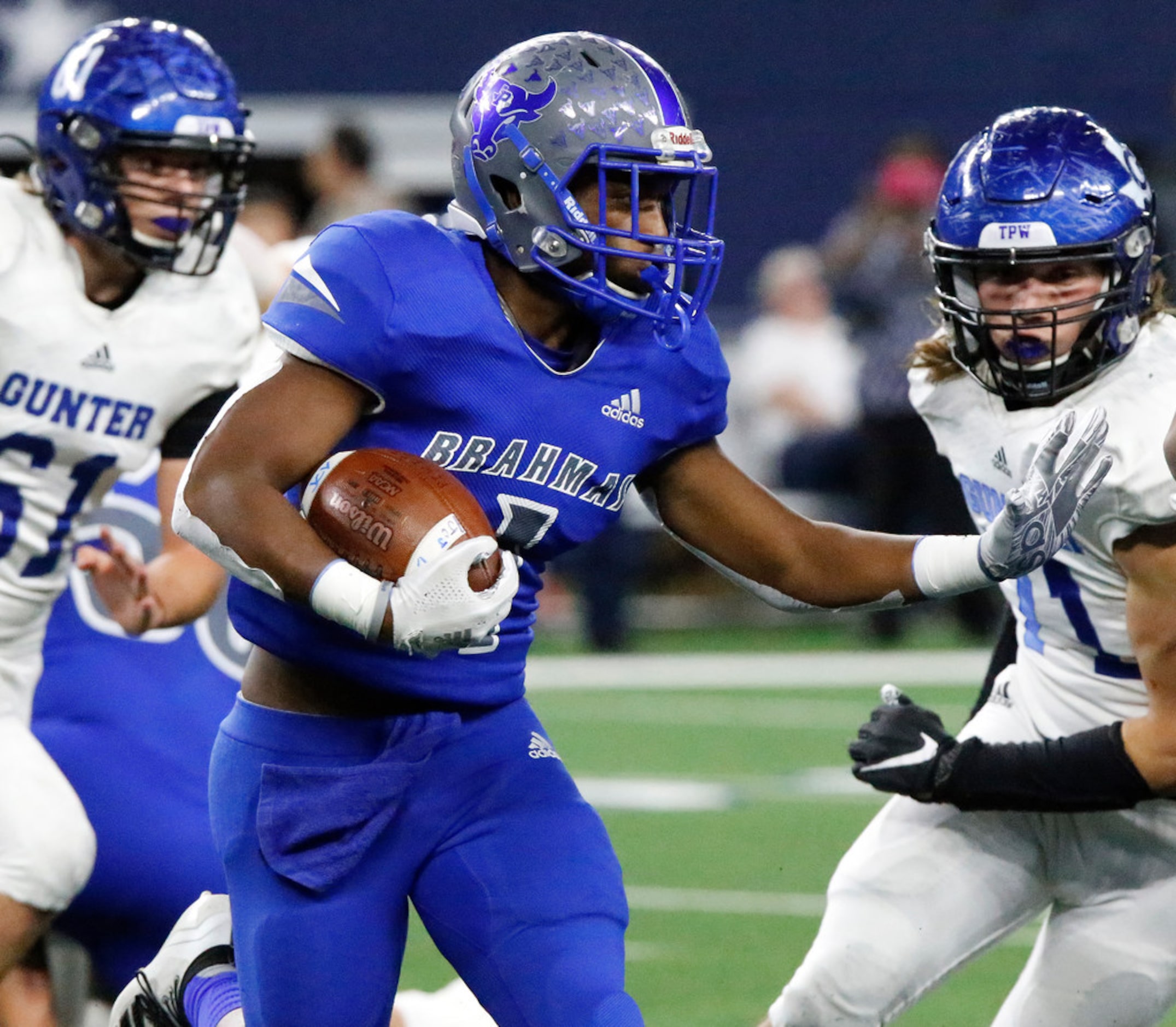 Omaha Pewitt High School running back Kadrien Johnson (1) carries the football during the...