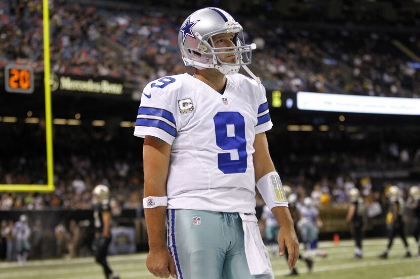 Dallas Cowboys quarterback Tony Romo (9) leaves the field after not converting on third down...