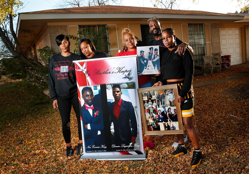 Antanique Johnson (left) and Richard King (second from right), who lost their sons Demico...