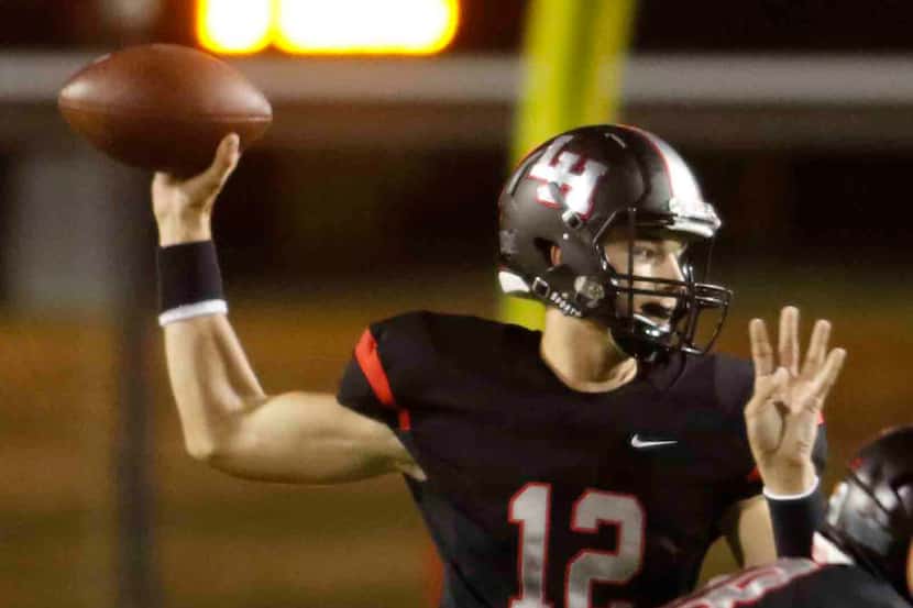 Lake Highlands quarterback Jakson Thomson (12) passes across the middle during first quarter...
