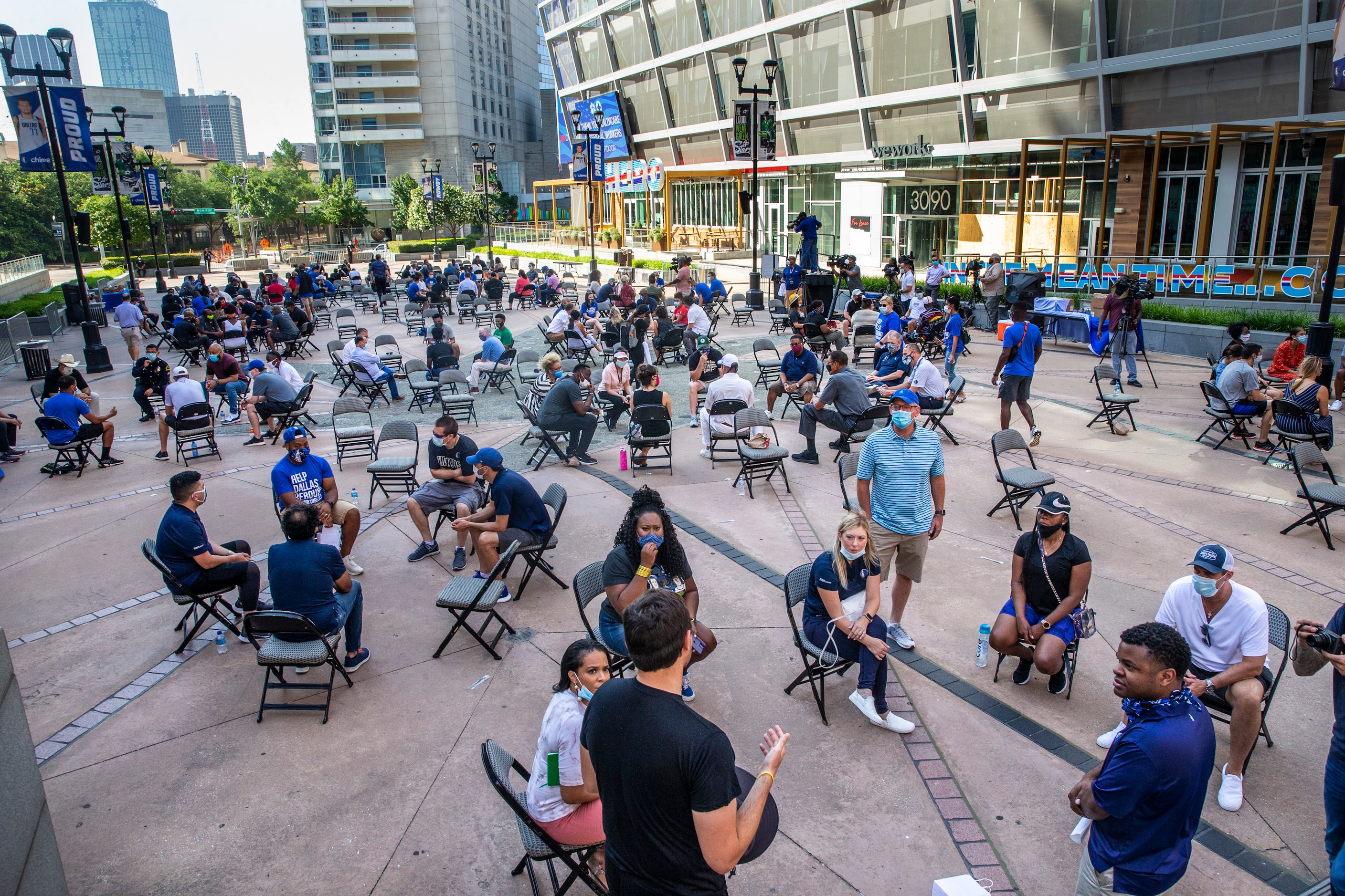 Attendees participate in small-group discussions about systemic racism during a Courageous...