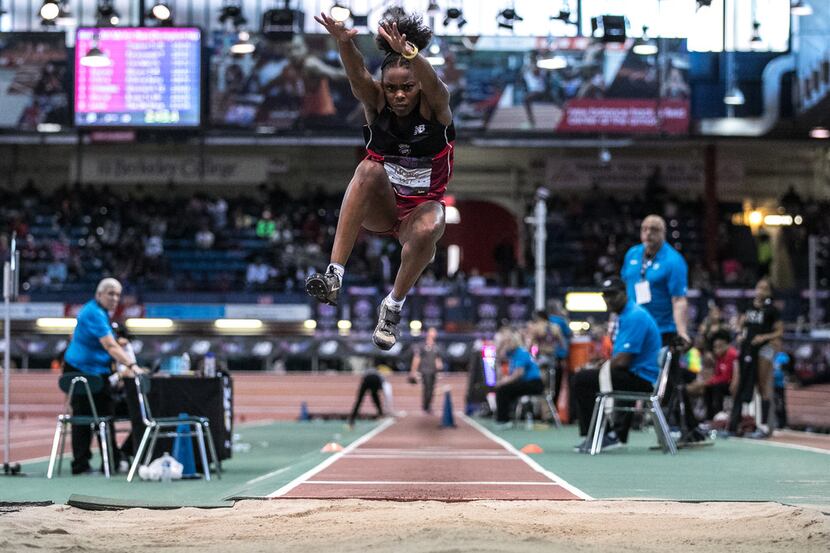 Mansfield Lake Ridge's Jasmine Moore makes an attempt in the girls triple jump finals during...