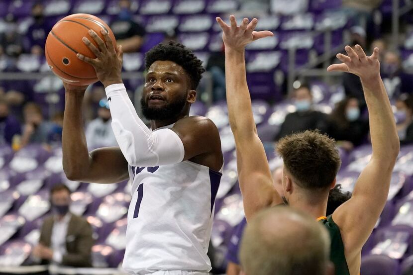 TCU guard Mike Miles (1) looks to the basket as North Dakota State guard Boden Skunberg...