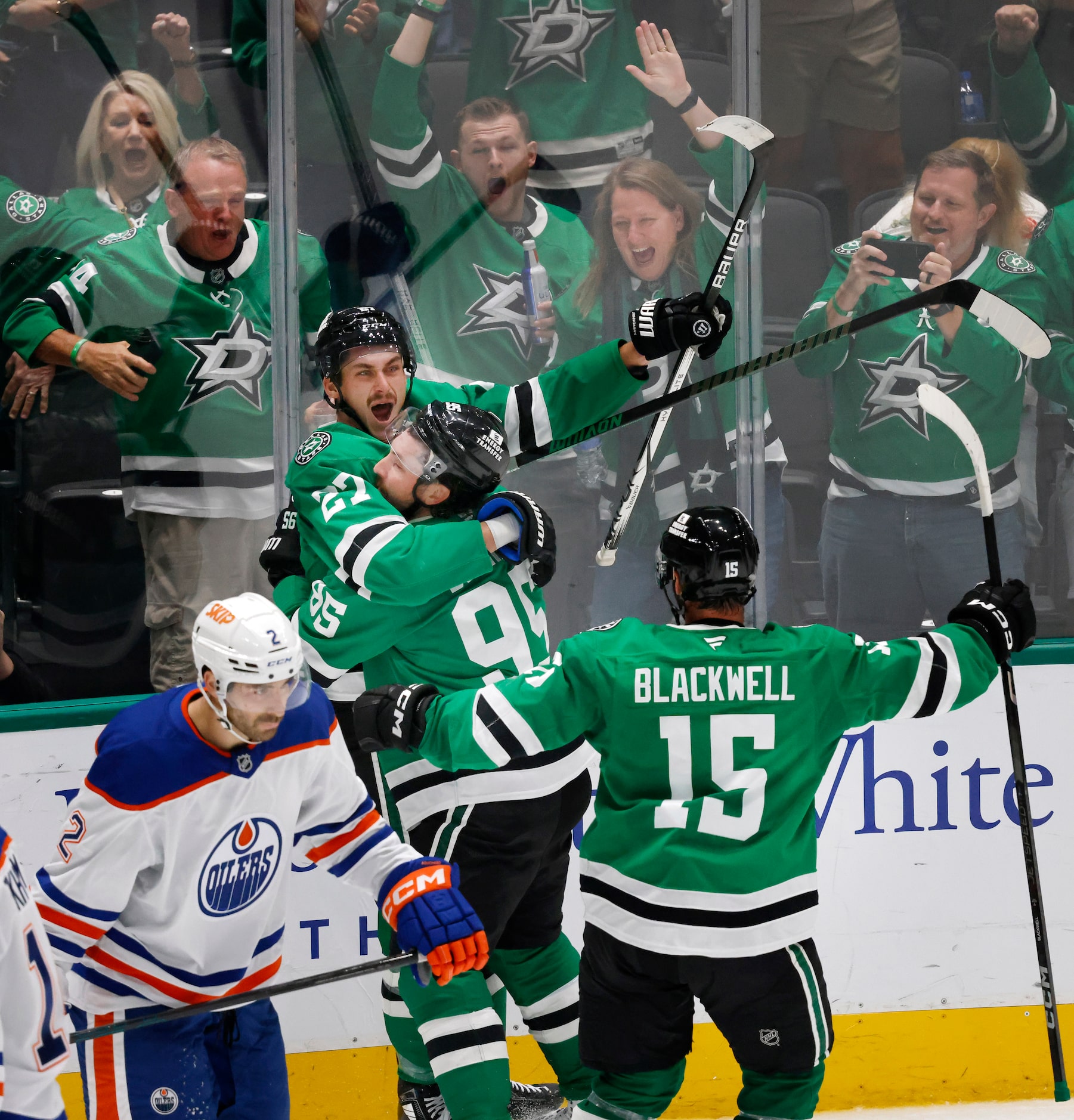 Dallas Stars left wing Mason Marchment (27) congratulates center Matt Duchene (95) on his...