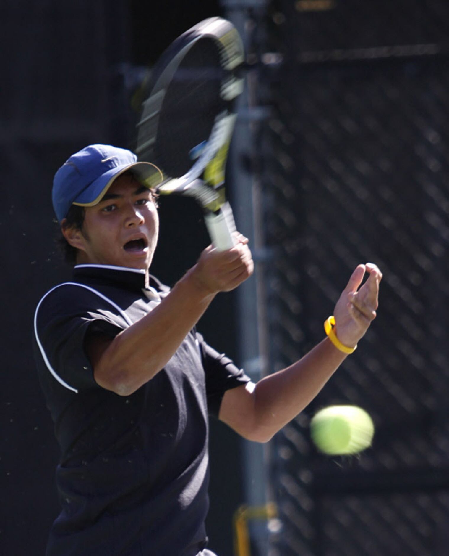Southlake Carroll's Eshan Dave hits the ball to Colin Markes of Round Rock Westwood during...
