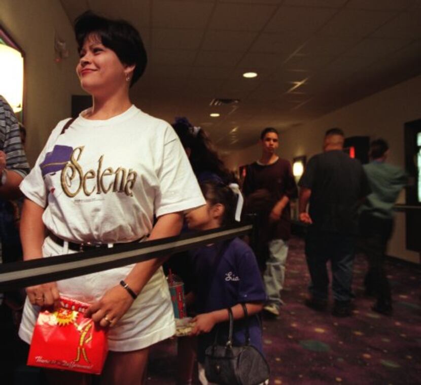 Elsa Salazar of Euless waits in line March 21, 1997, to  enter the 7 p.m. showing of Selena...