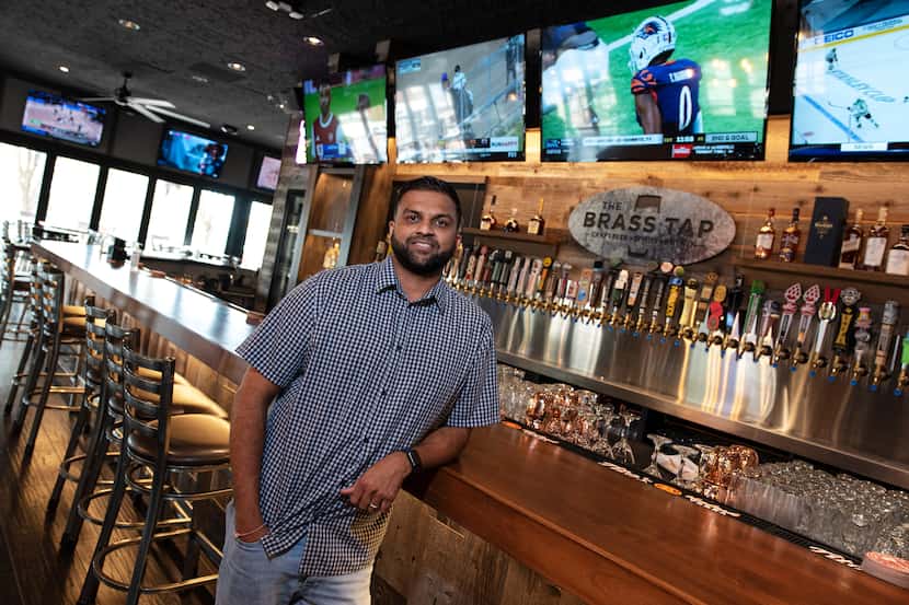Co-owner Ridham Bhatt and his restaurant bar The Brass Tap in Rockwall