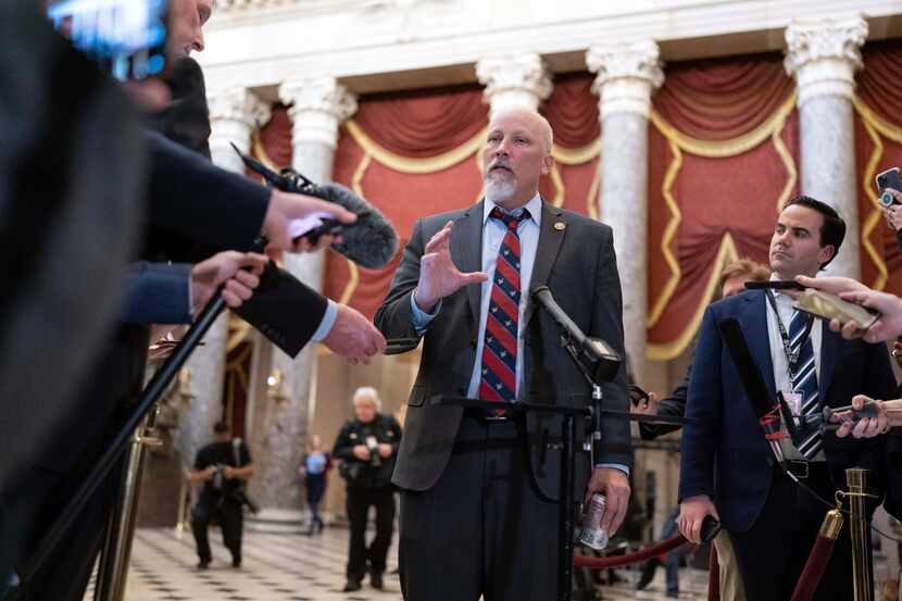 Rep. Chip Roy, R-Texas, a member of the conservative Freedom Caucus, talks to reporters in...