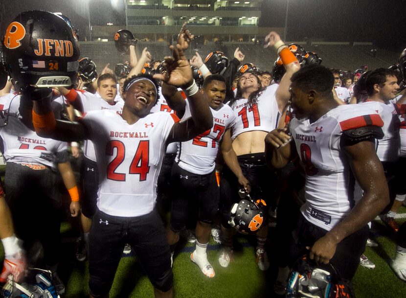 Rockwall linebacker Chib Ihediwa (24) helps lead the Yellowjackets' celebration following...