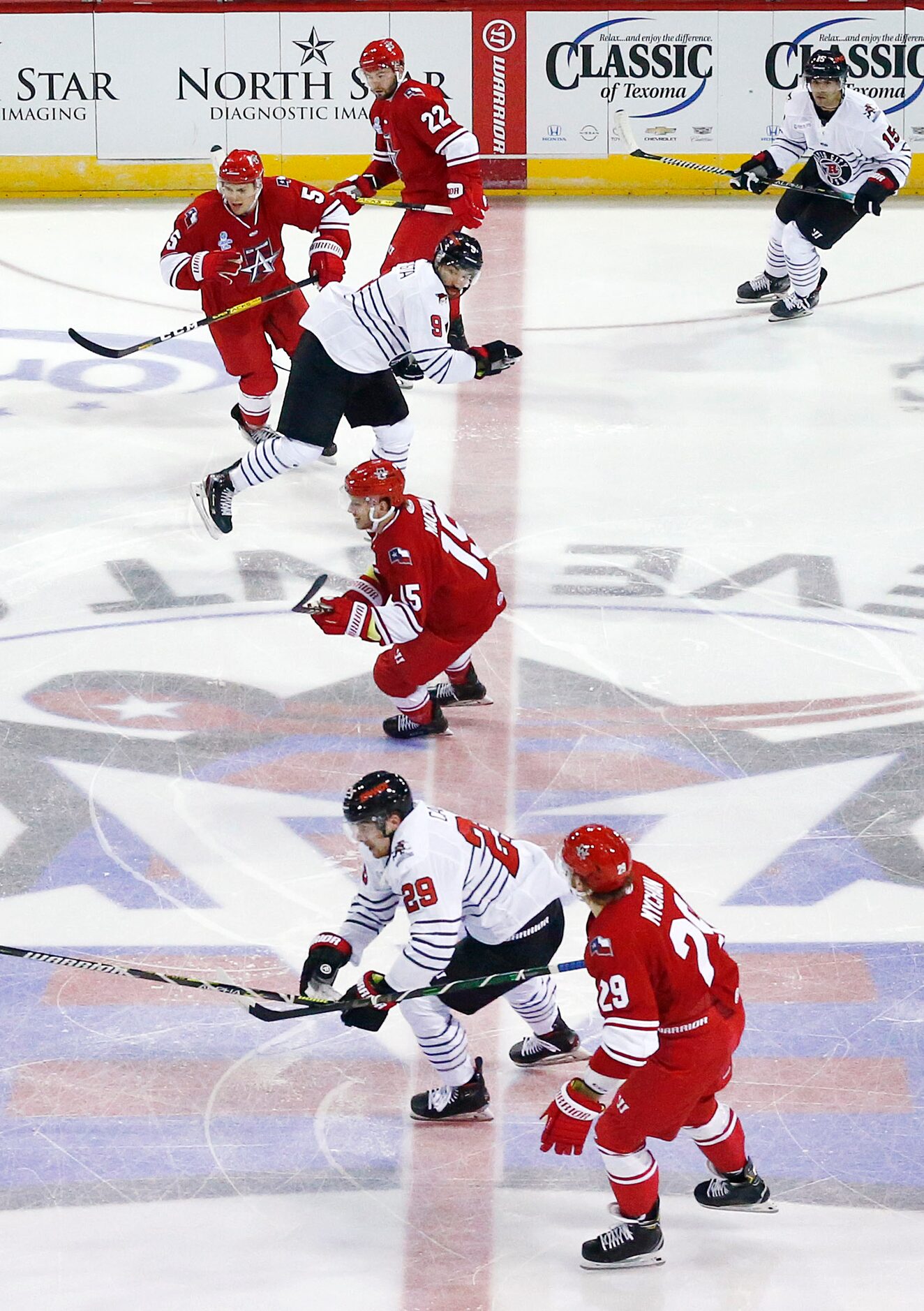 The Allen Americans and Rapid City Rush hockey players compete during the season opener at...