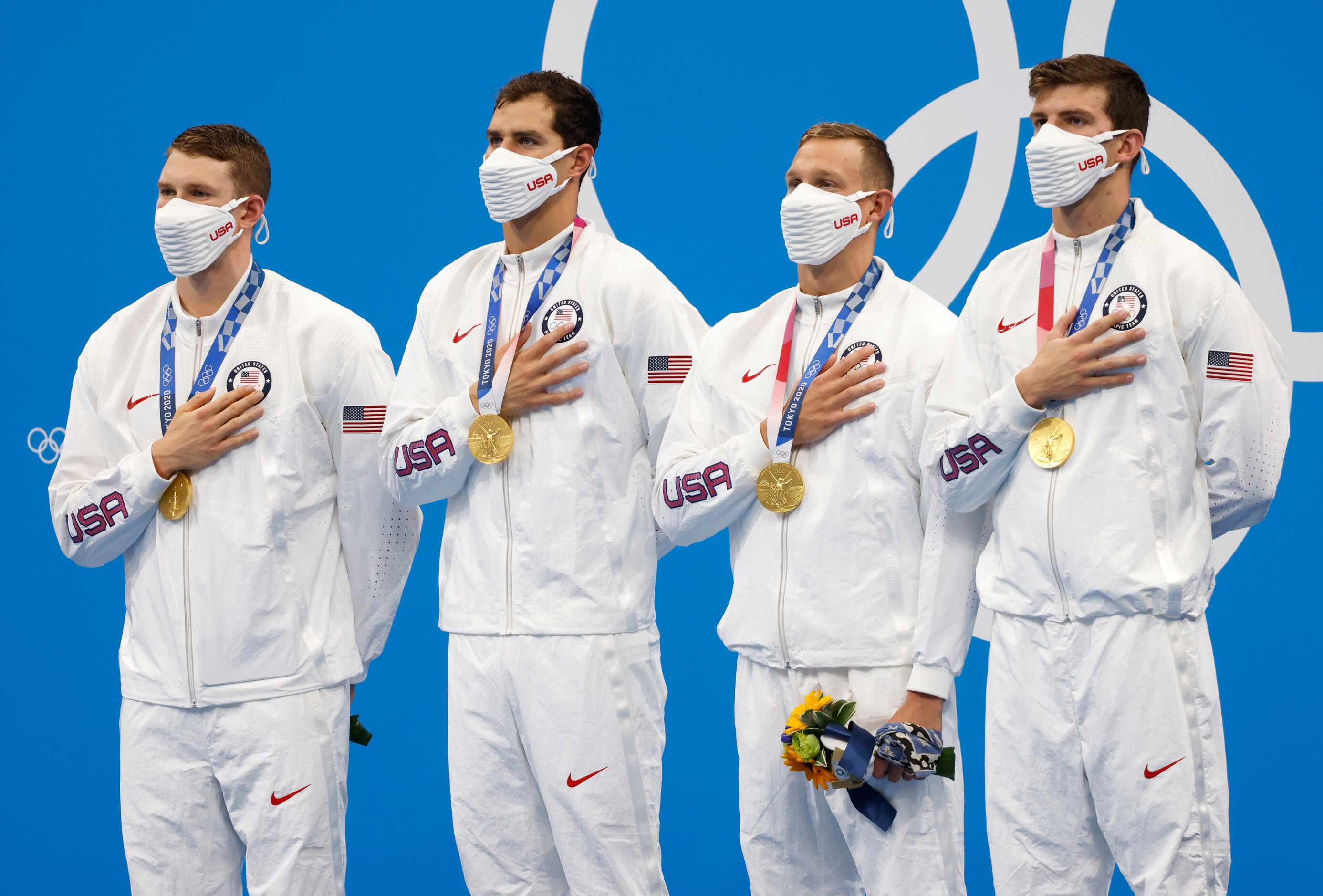 (Left to right) USA’s Ryan Murphy, Michael Andrew, Caeleb Dressel, and Zach Apple stand as...