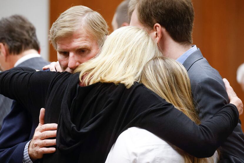 The Crews family embrace each other after Brenda Kelly, former girlfriend of Jonathan was...