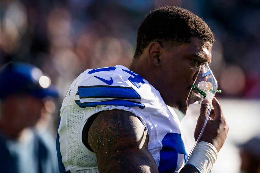 Dallas Cowboys defensive end Randy Gregory takes oxygen on the sidelines during the first...