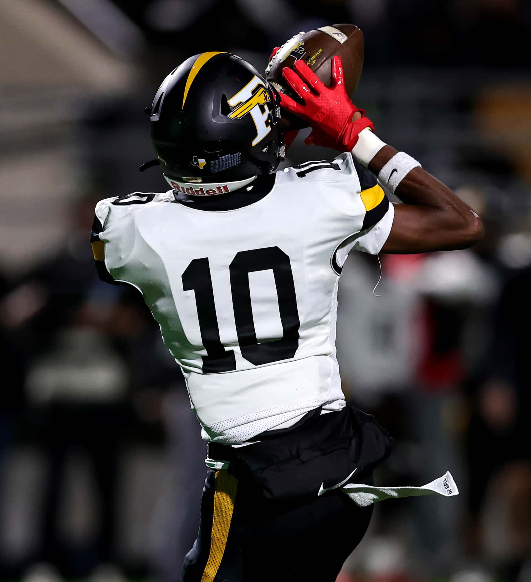 Forney wide receiver Kofi Eduful (10) grabs one of his three touchdowns against Richland in...