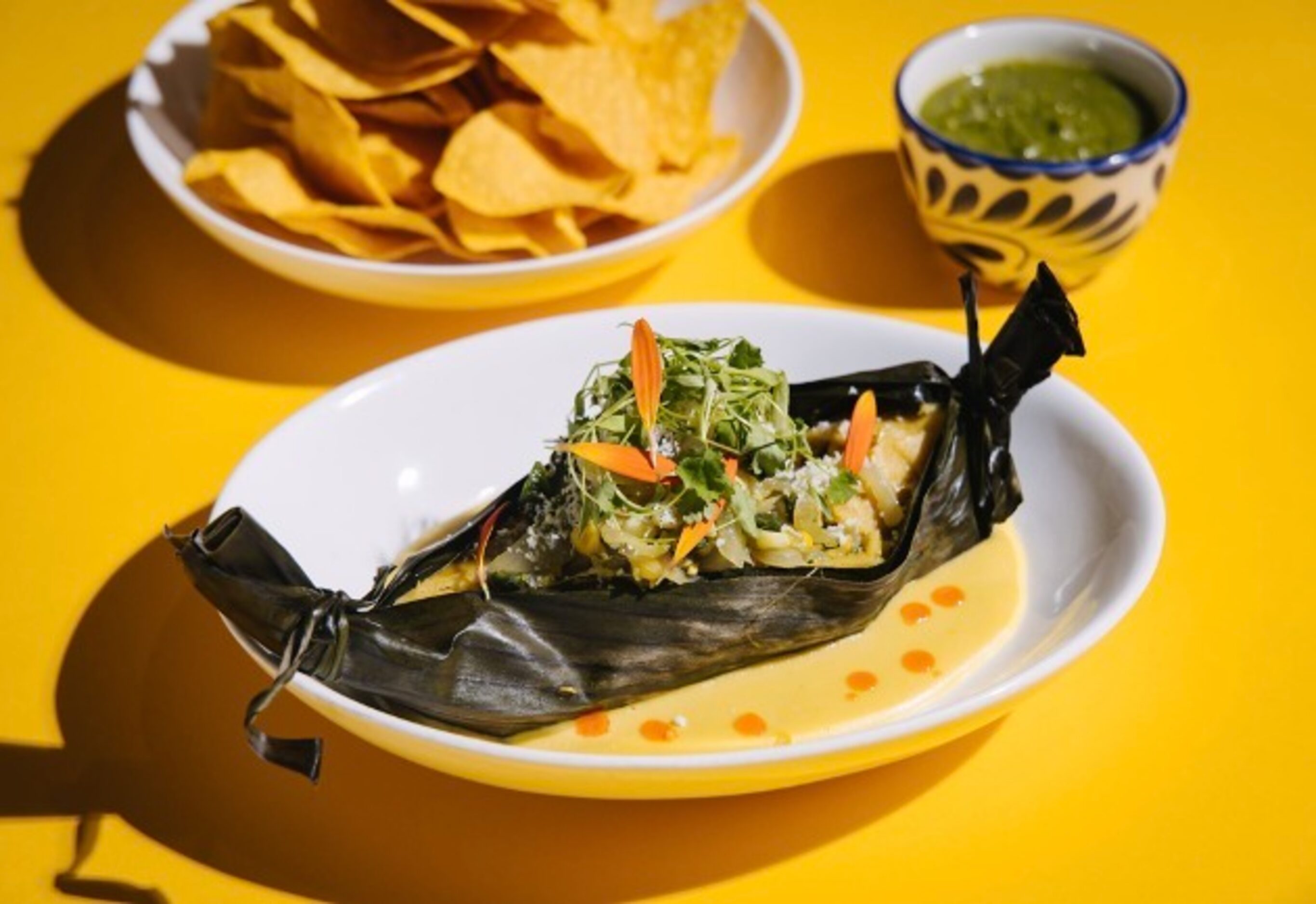 Wild Salsa's poblano tamale is a fire-roasted poblano stuffed with corn, caramelized onions...