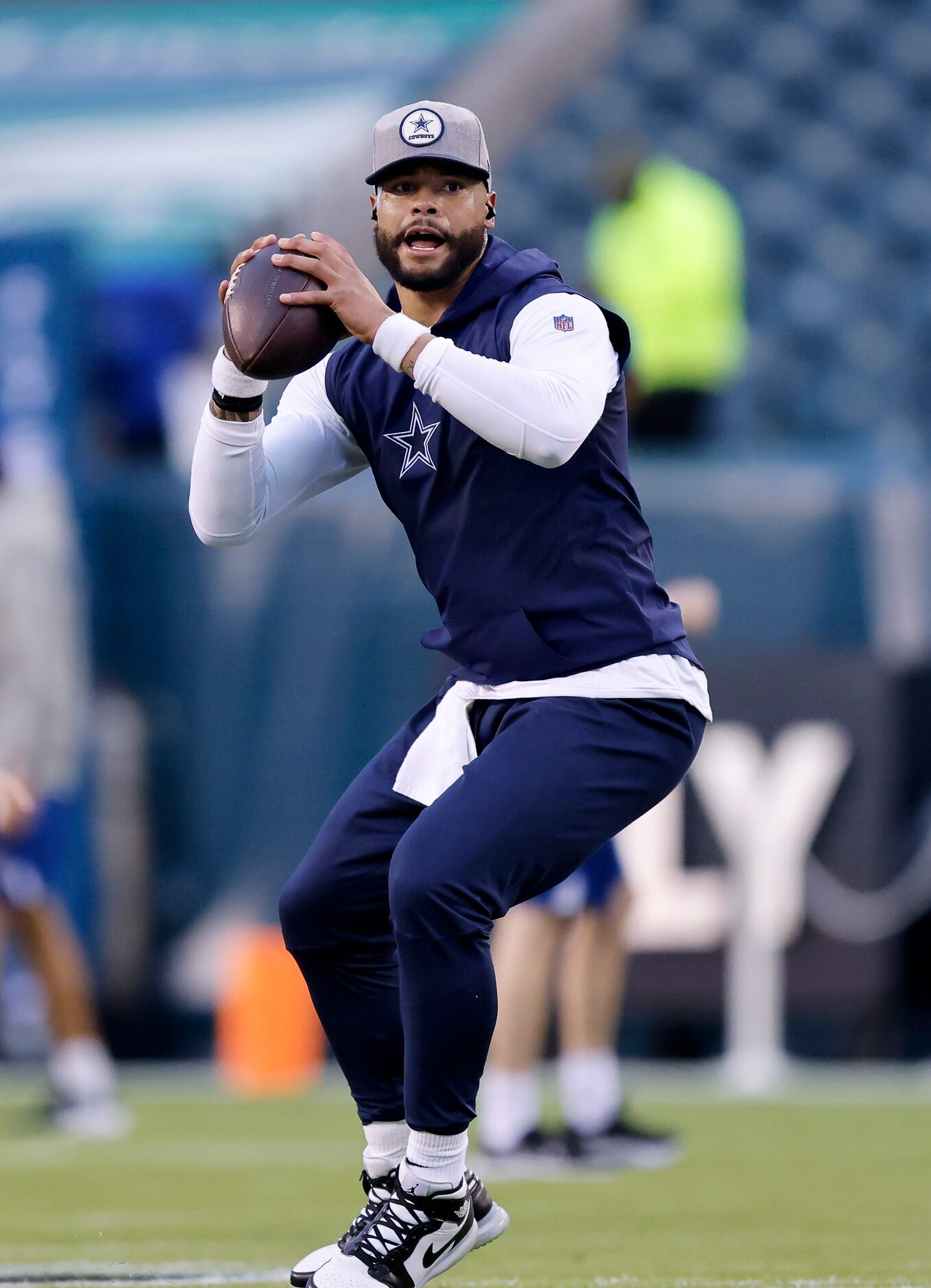 Dallas Cowboys quarterback Dak Prescott practices his throwing during pregame warmups at...