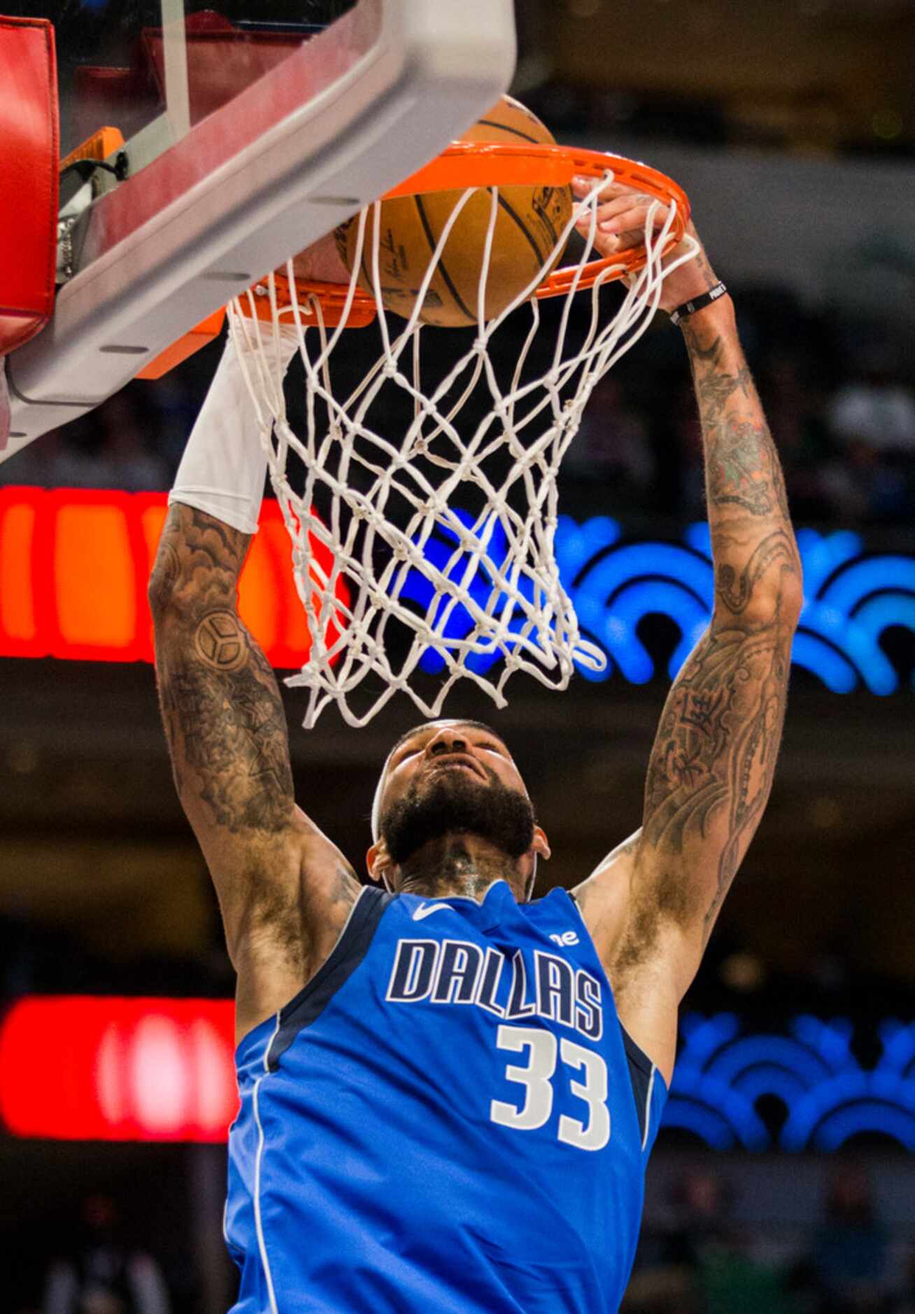 Dallas Mavericks center Willie Cauley-Stein (33) dunks during the fourth quarter of an NBA...