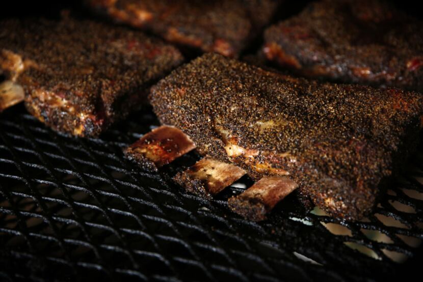 Beef ribs on the smoker at Stiles Switch BBQ & Brew.