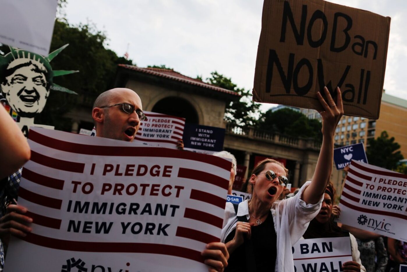 Opponents of President Donald Trump's travel ban gathered at a demonstration in New York in...