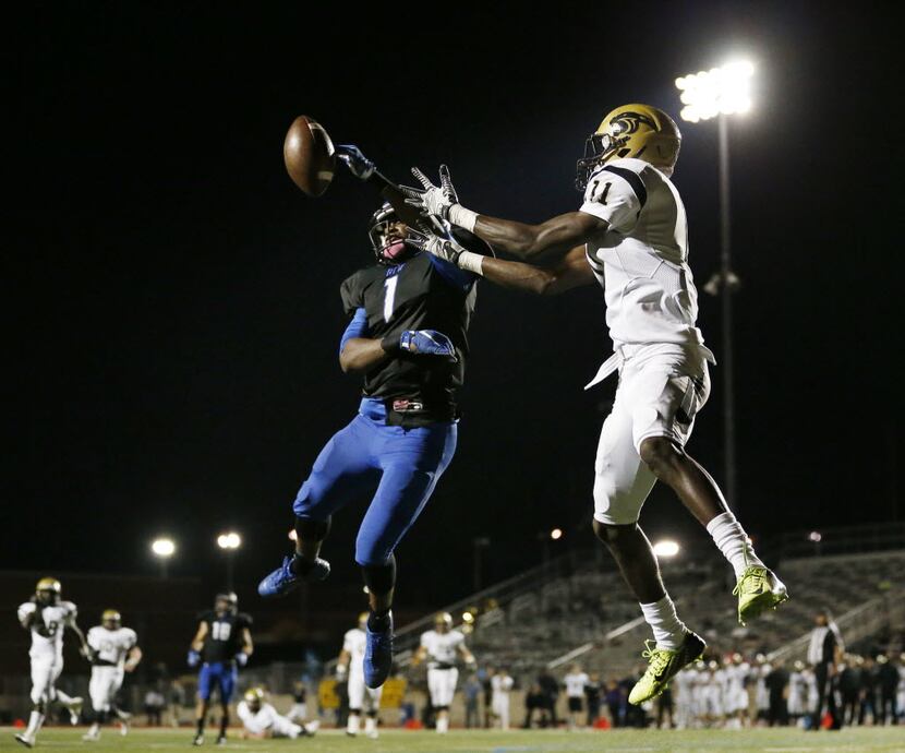 Hebron defensive back Isaiah Gary (1) breaks up a pass intended by Plano East wide receiver...