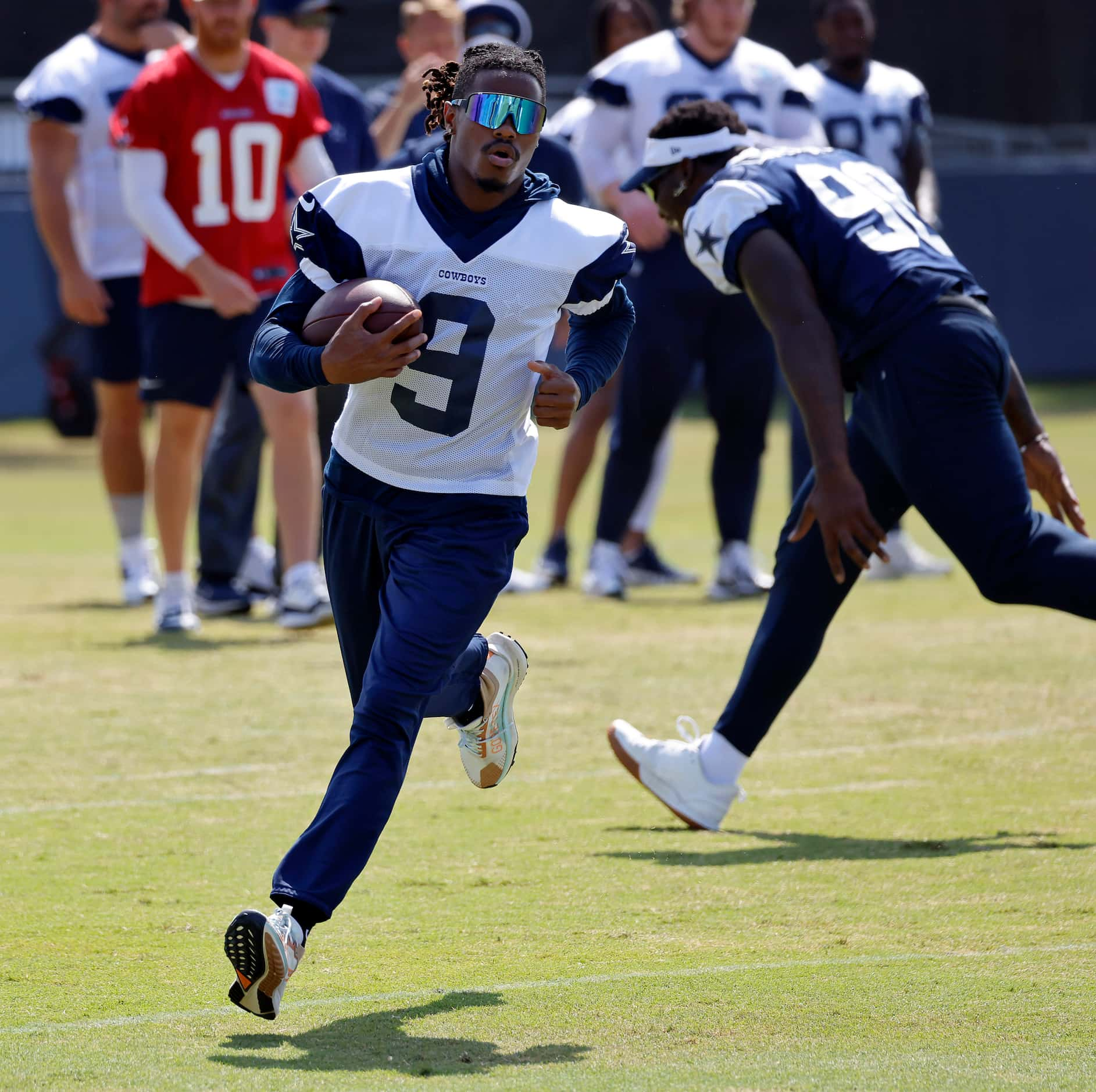 Dallas Cowboys wide receiver KaVontae Turpin (9) carries the ball on a sweep during a mock...