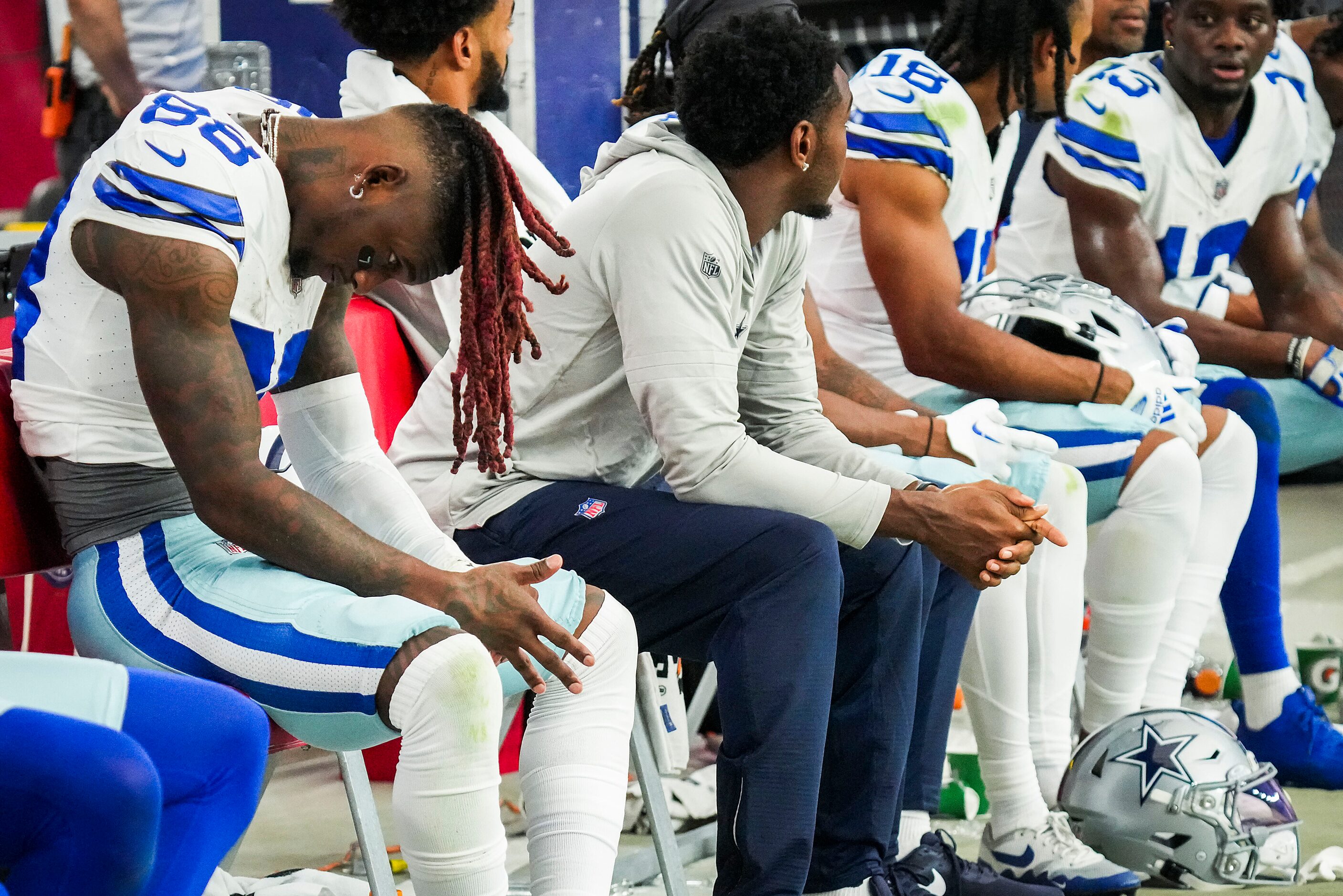 Dallas Cowboys wide receiver CeeDee Lamb (88) sits on the bench after Arizona Cardinals...