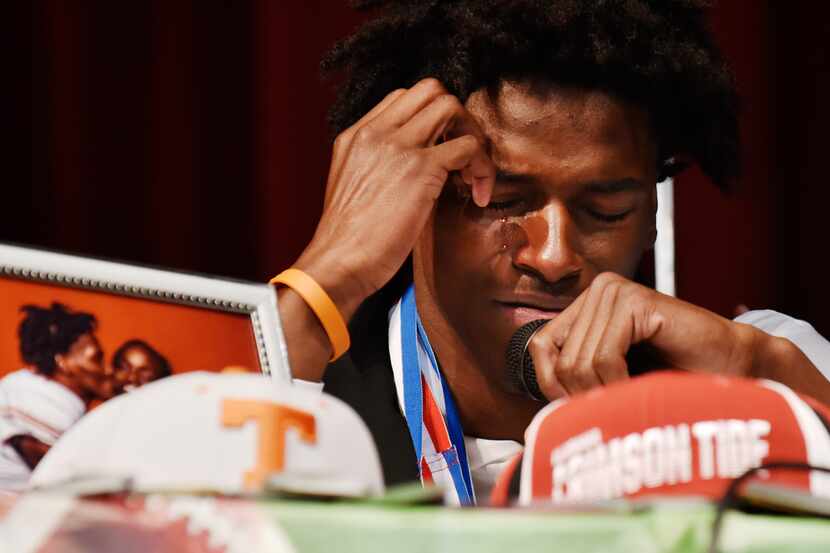 Duncanville cornerback Ennis Rakestraw, Jr., begins to cry as he speaks about his family and...