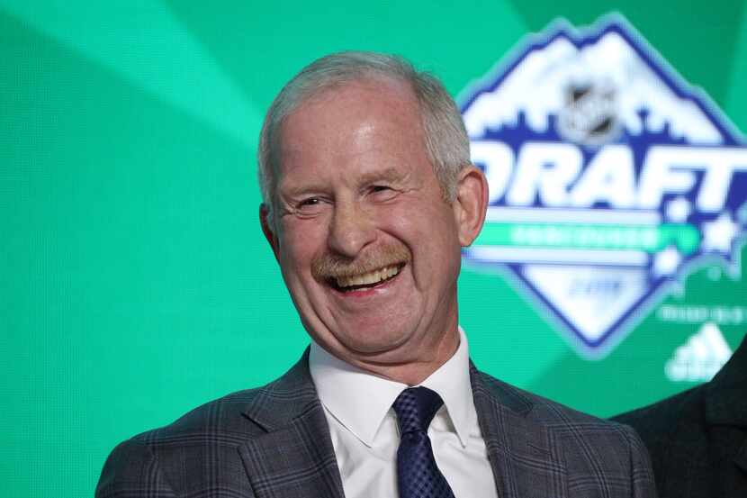 General Manager Jim Nill of the Dallas Stars stands onstage during the first round of the...