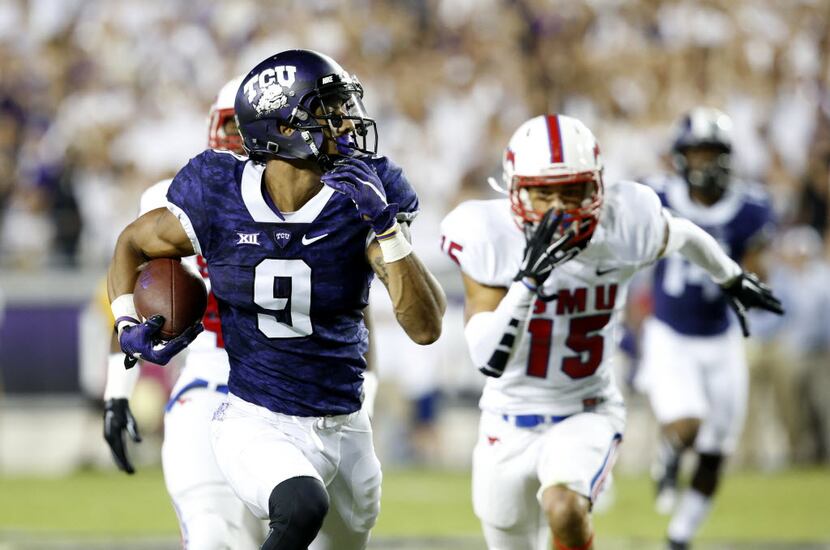 TCU Horned Frogs wide receiver Josh Doctson (9) runs the ball during the first quarter of...
