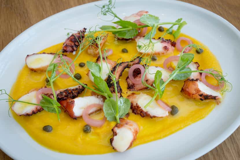 Octopus Santorini features succulent disks of tentacle served on split-pea purée with...