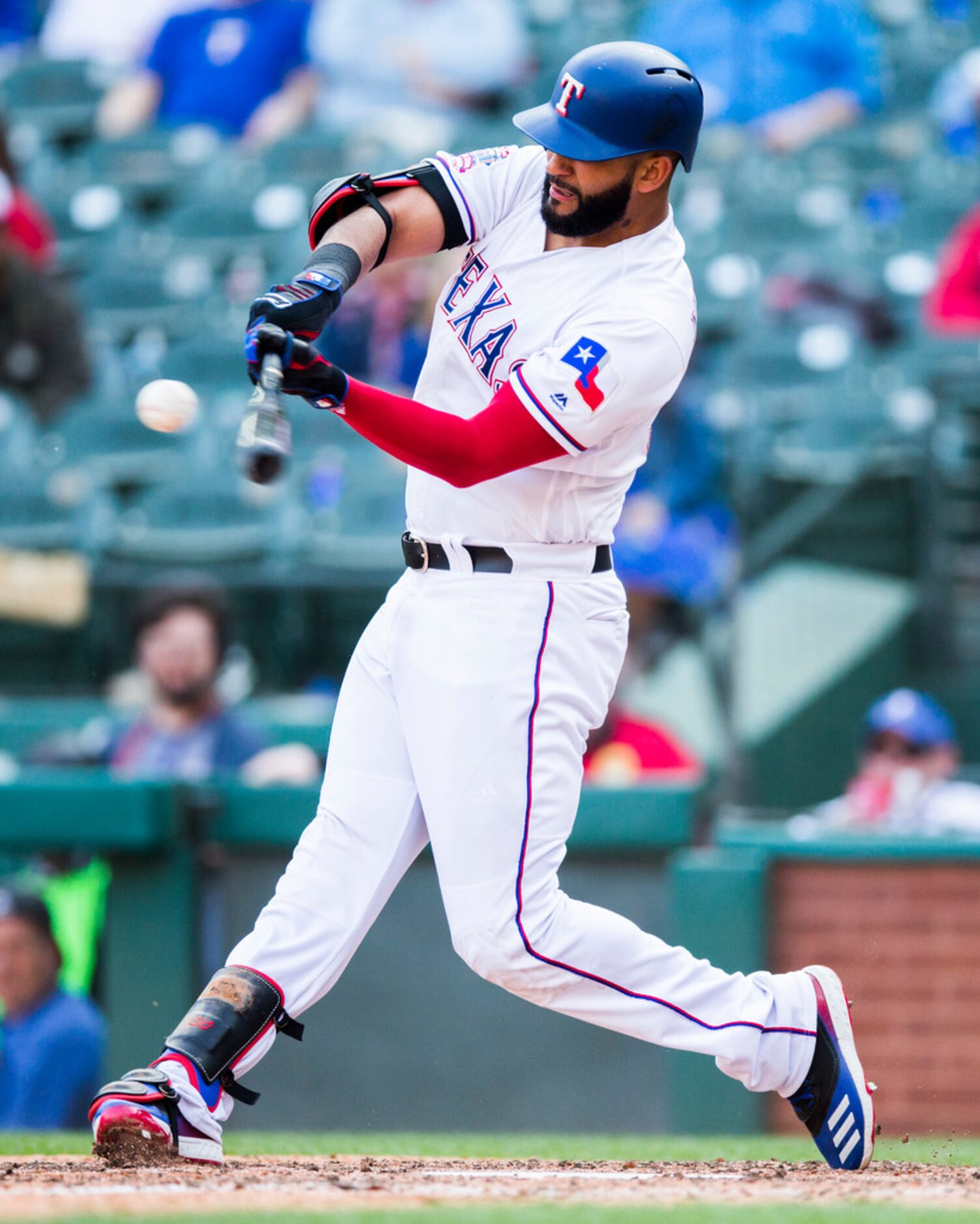 Texas Rangers right fielder Nomar Mazara (30) hits a home run during the ninth inning of an...