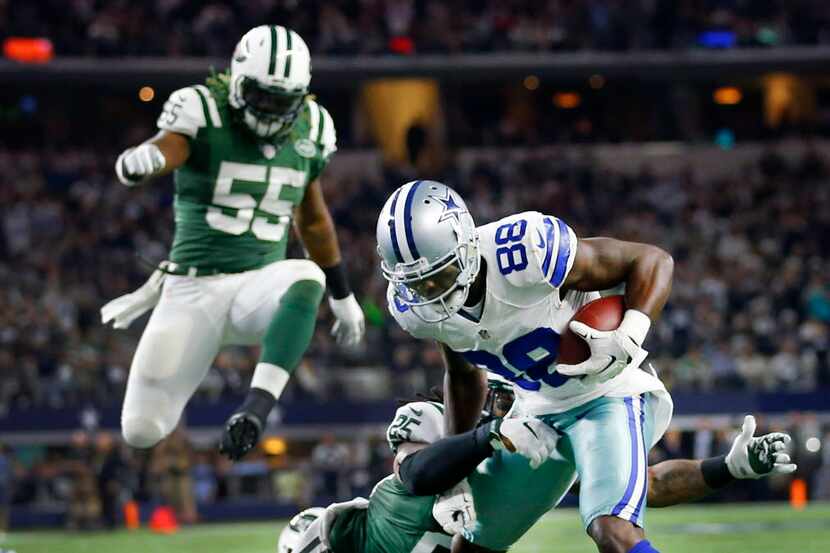 Dallas Cowboys wide receiver Dez Bryant (88) shakes New York Jets strong safety Calvin Pryor...