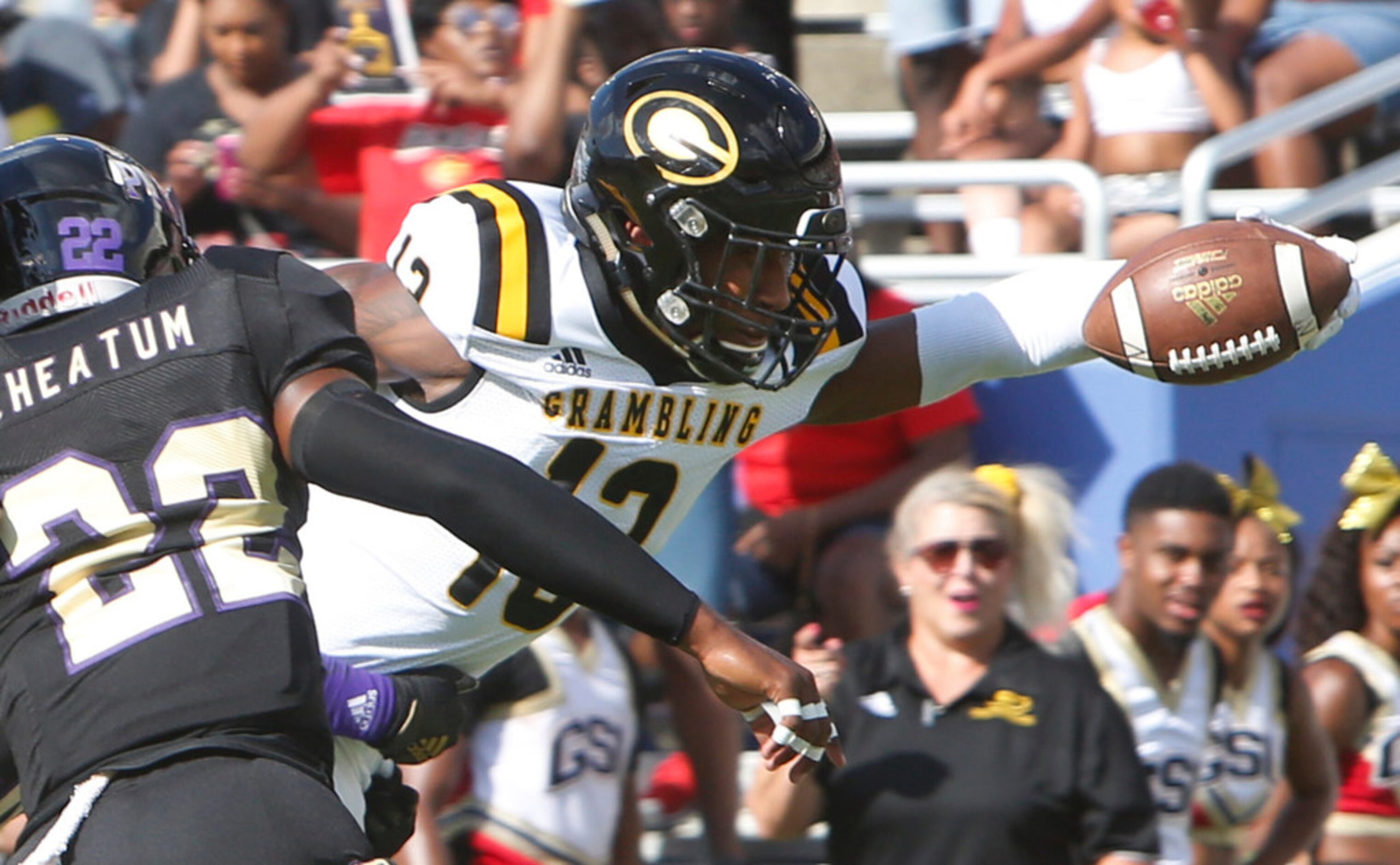 Gambling State receiver Quintin Guice (13) lunges across into the end zone for a first...