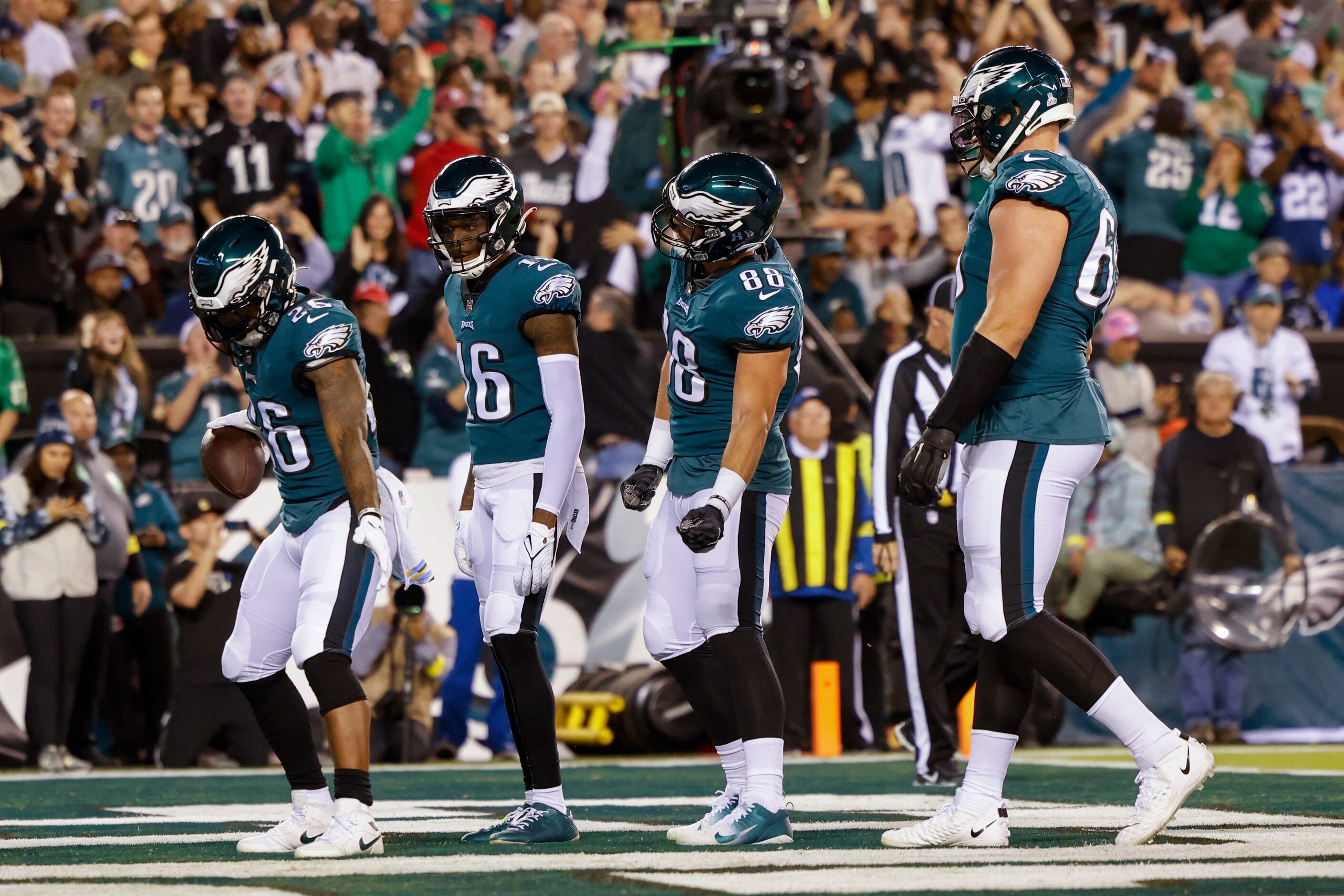 Philadelphia Eagles running back Miles Sanders (26) celebrates after a touchdown with...