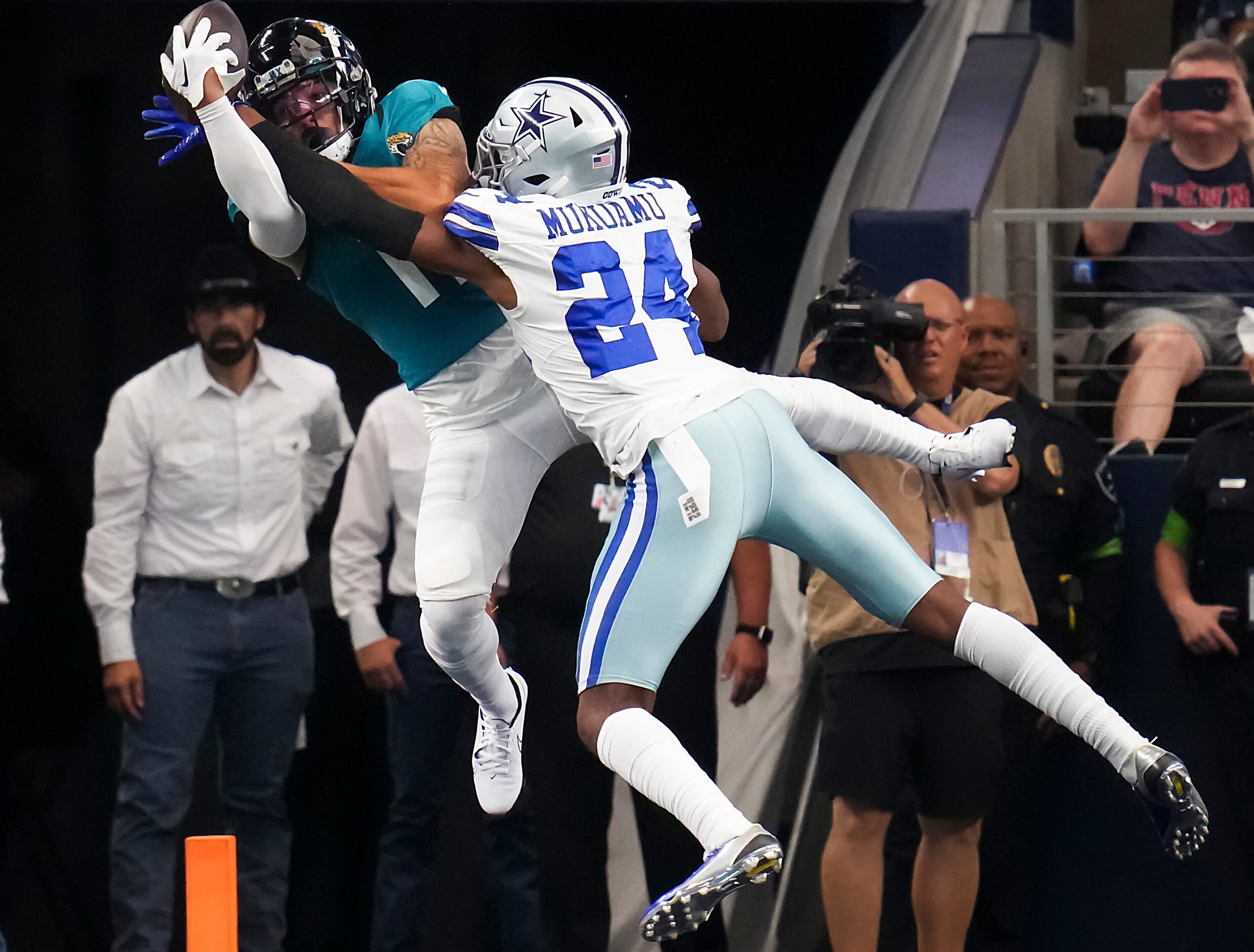 Dallas Cowboys safety Israel Mukuamu (24) breaks up a pass intended for Jacksonville Jaguars...