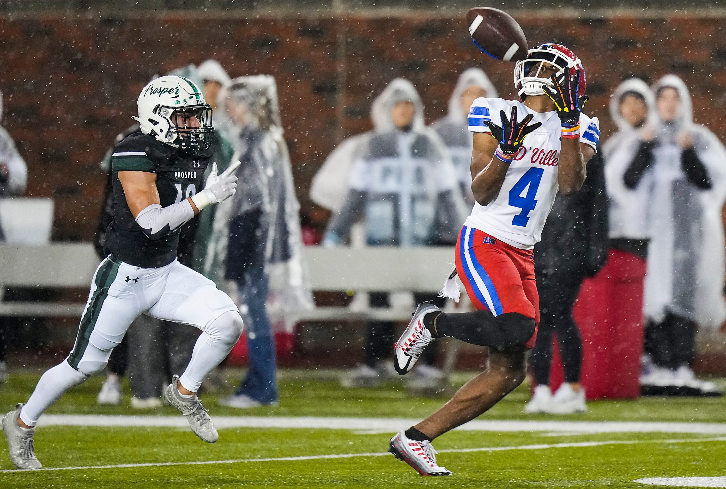 Duncanville wide receiver Dakorien Moore (4) hauls in a 59-yard touchdown pass as Prosper...