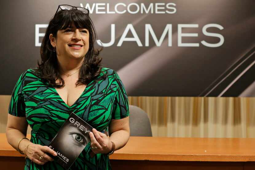 Author EL James poses for photographers before signing her new book, Grey, at a Barnes and...