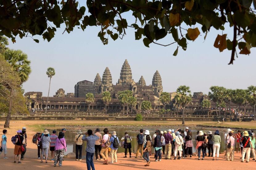 Millions of tourists visit the famed Angkor Wat temple in Siem Reap, Cambodia, every year....