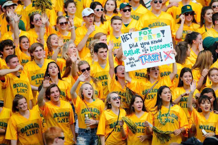 Baylor fans cheer for their team against Kansas during the first quarter at McLane Stadium...