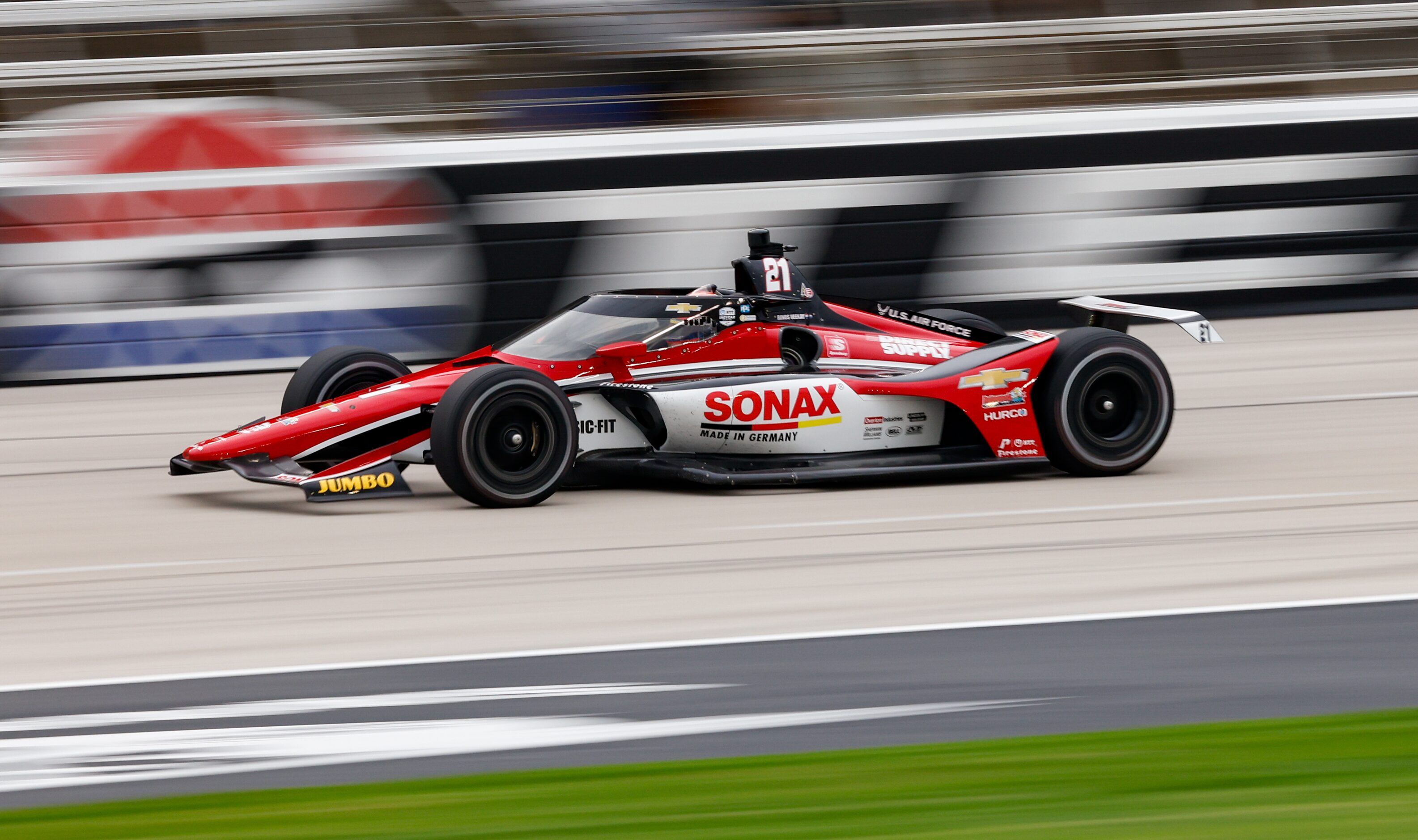 Rinus VeeKay (#21) races during the IndyCar Genesys 300 at Texas Motor Speedway on Saturday,...