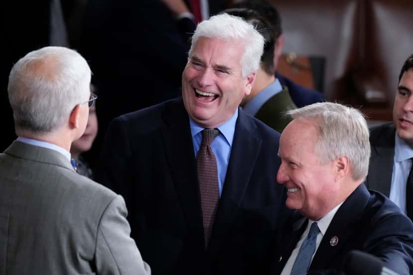 House Majority Whip Tom Emmer, R-Minn., speaks with Rep. Patrick McHenry, R-N.C., the...