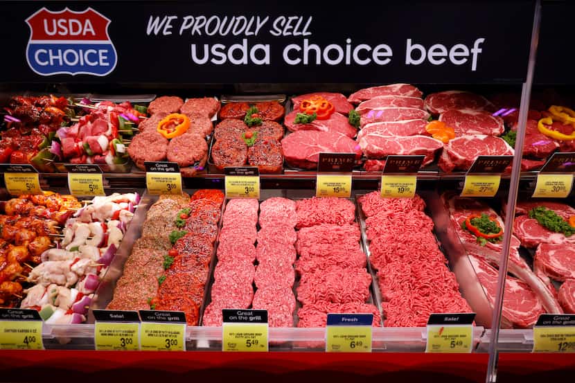 USDA Choice beef is displayed in a cooler at the Tom Thumb grocery store on Live Oak Street,...